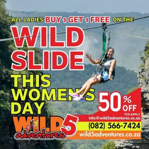 A woman smiles as she glides on the Wild Slide zipline across the cliffs of Oribi Gorge, featuring a Wild 5 Adventures promo banner for the Women's Day buy one get one free special.