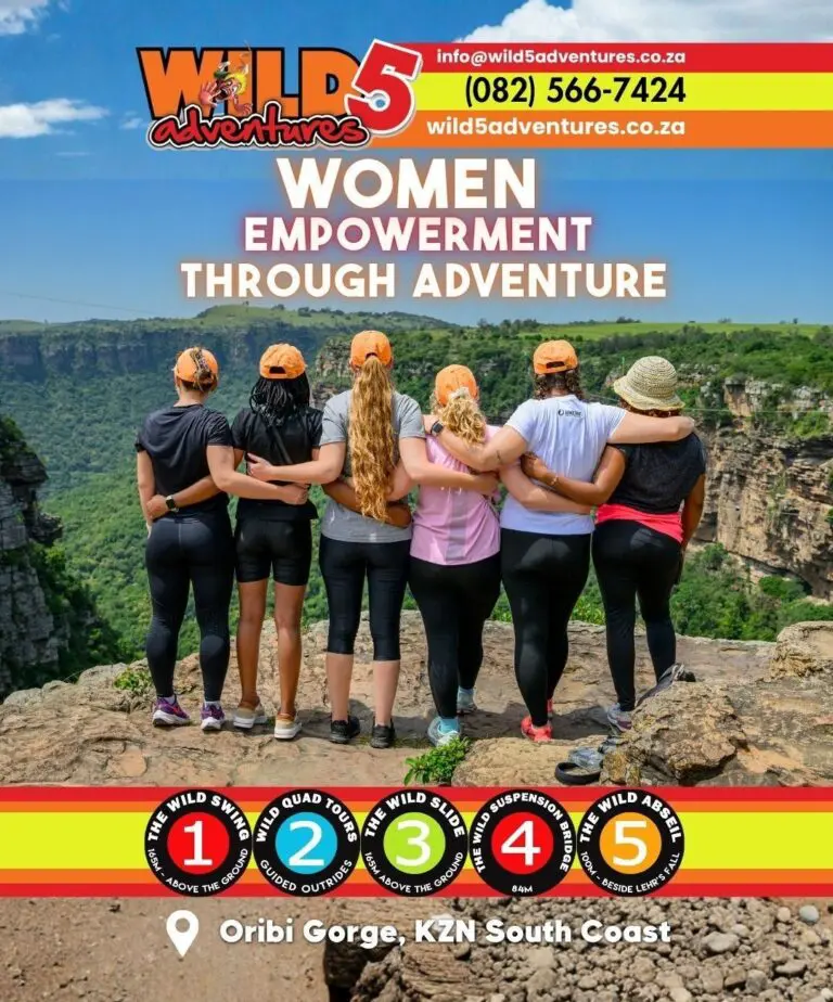 A group of five women stand arms locked looking over Oribi Gorge on the KZN South Coast, featuring a Wild 5 Adventures banner titled Women Empowerment Through Adventure.